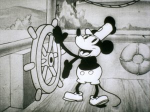 So ähnlich sah Micky Maus auch in dem ersten Film "Plane Crazy" aus. Hier sieht man eine Szene aus "Steamboat Willie", ein Film, der im November 1928 erschien. (Foto: dpa)